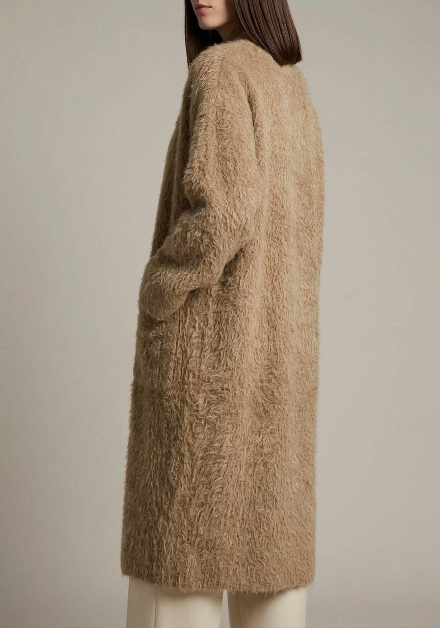 Gilet long texturé  Allure chic et effet duveteux