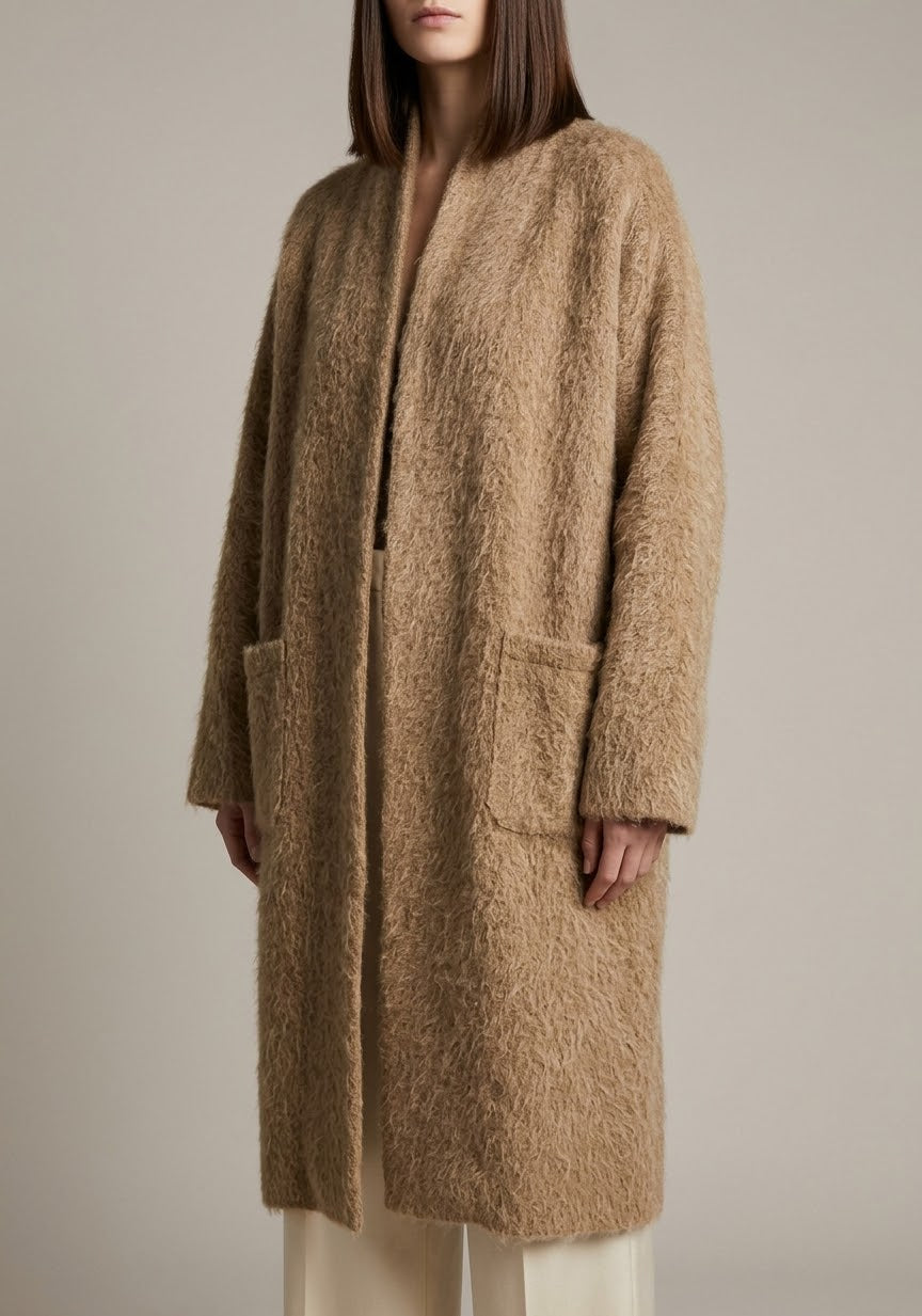 Gilet long texturé  Allure chic et effet duveteux