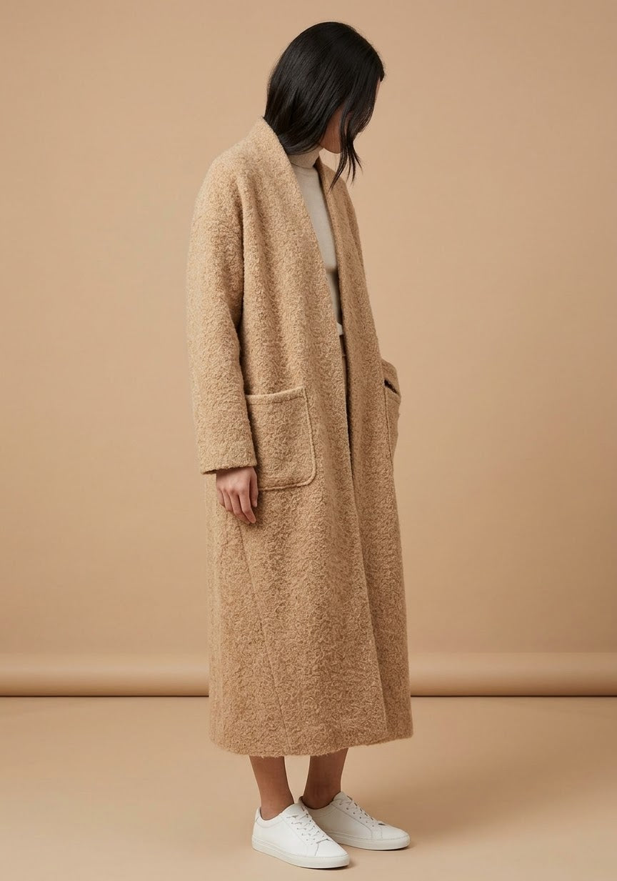 Gilet long texturé  Allure chic et effet duveteux