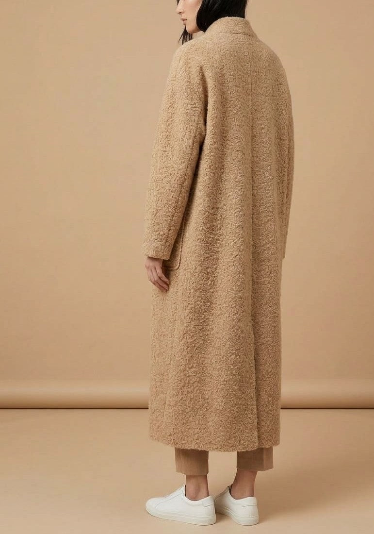 Gilet long texturé  Allure chic et effet duveteux