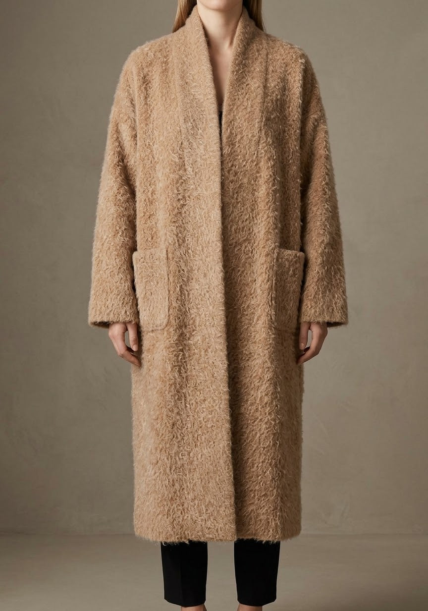 Gilet long texturé  Allure chic et effet duveteux
