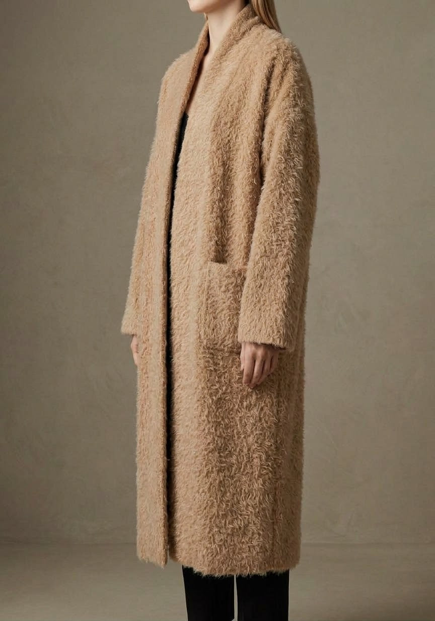 Gilet long texturé  Allure chic et effet duveteux