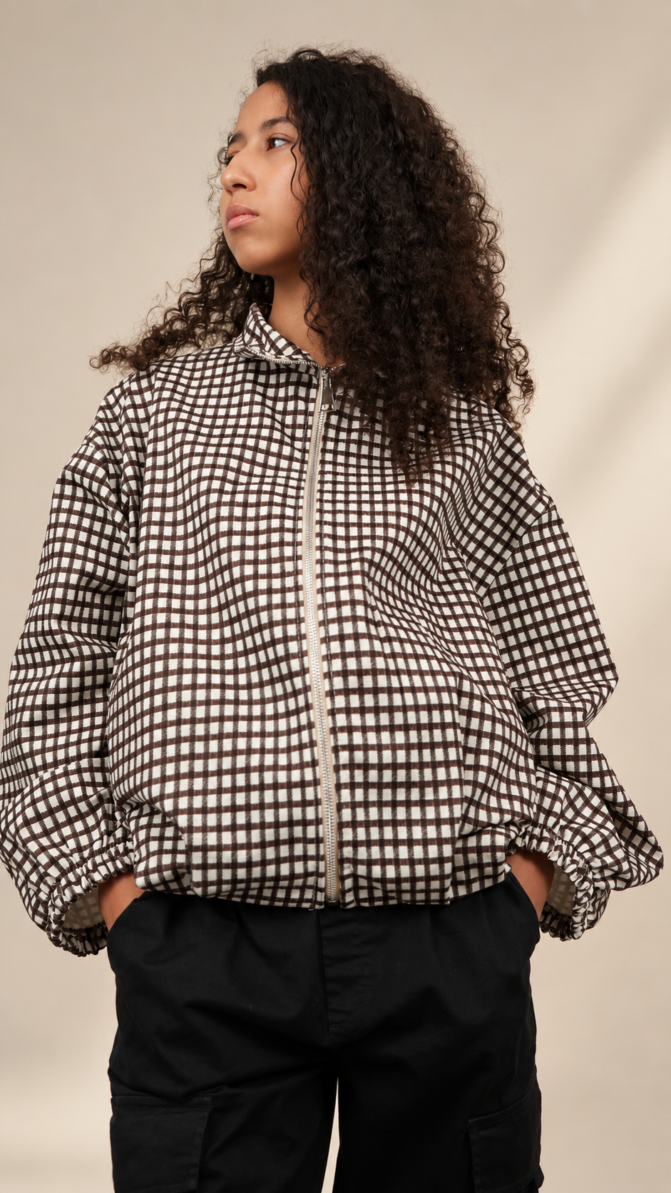 Veste à carreaux zippée pour femme