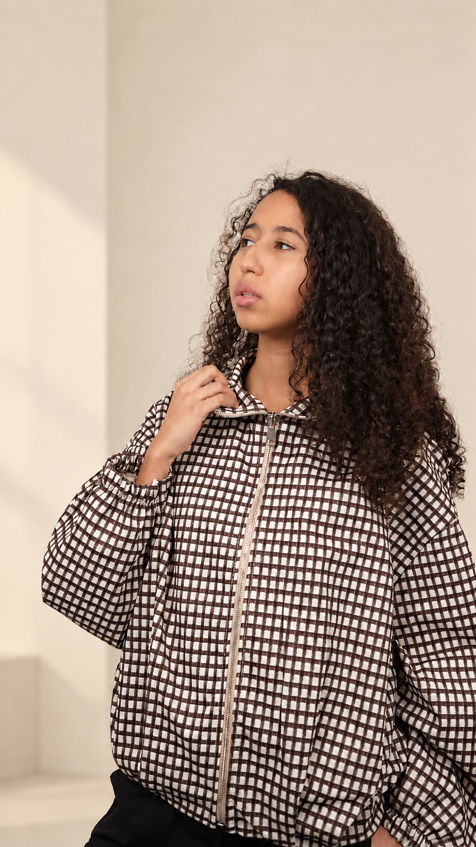 Veste à carreaux zippée pour femme