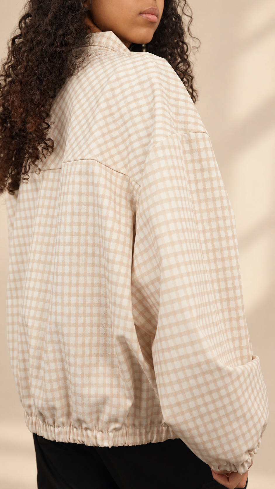 Veste à carreaux zippée pour femme