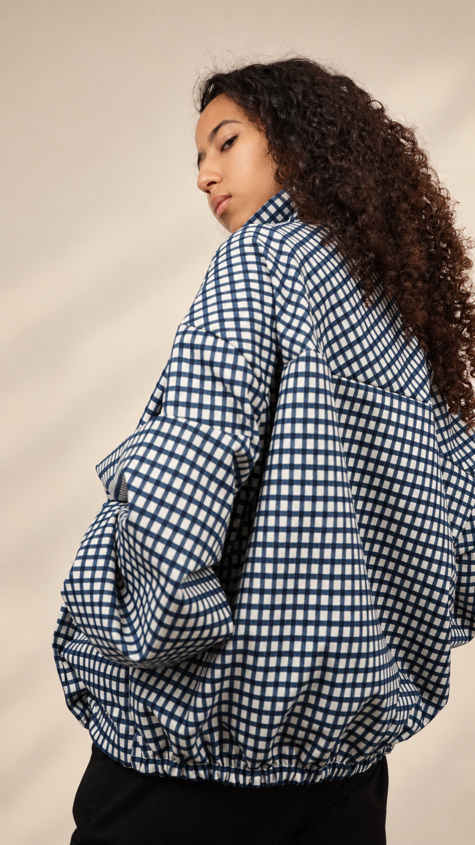 Veste à carreaux zippée pour femme