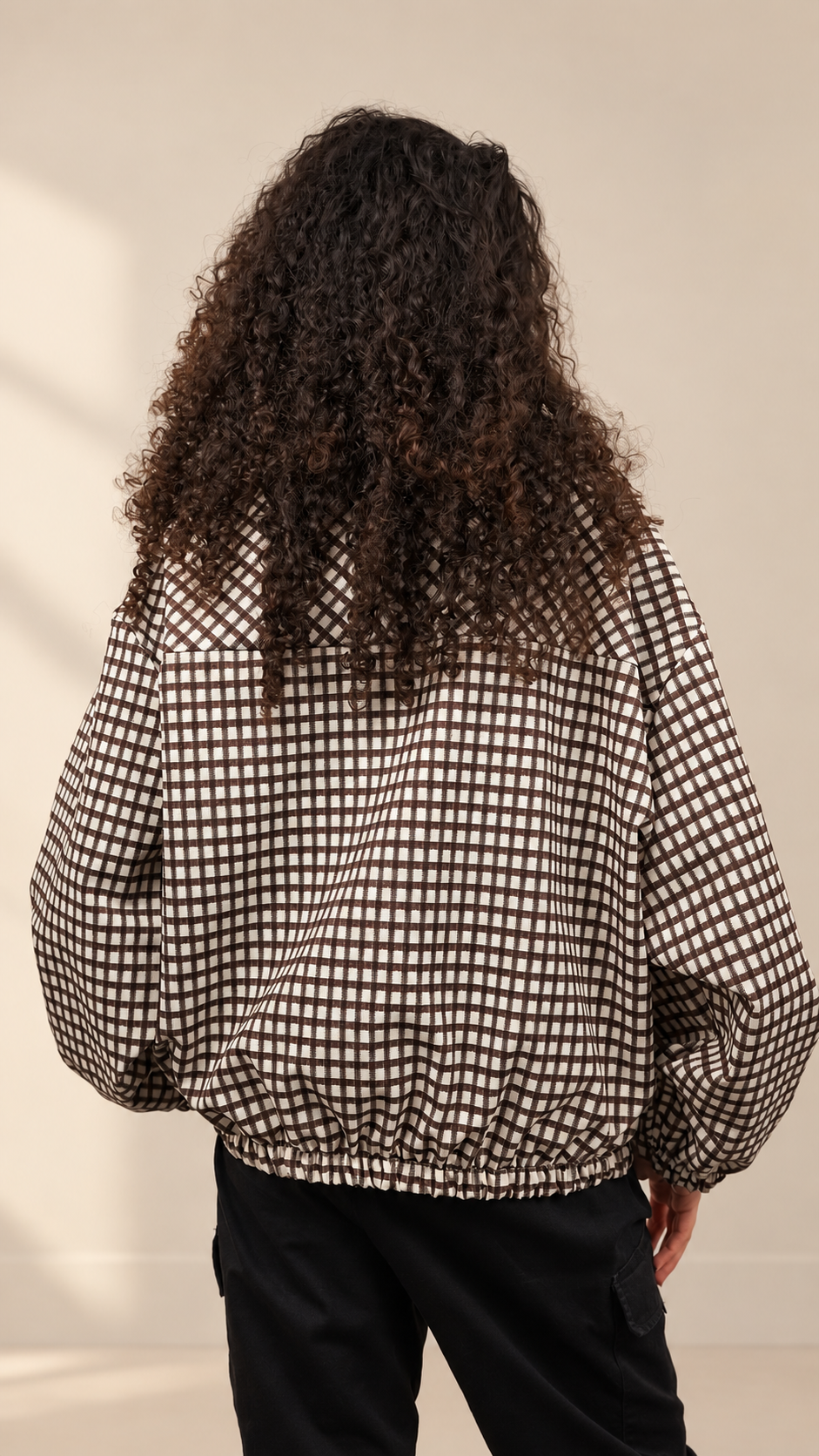 Veste à carreaux zippée pour femme