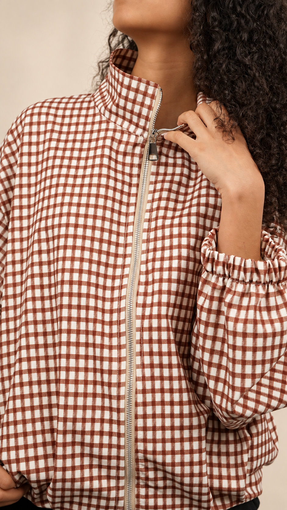 Veste à carreaux zippée pour femme